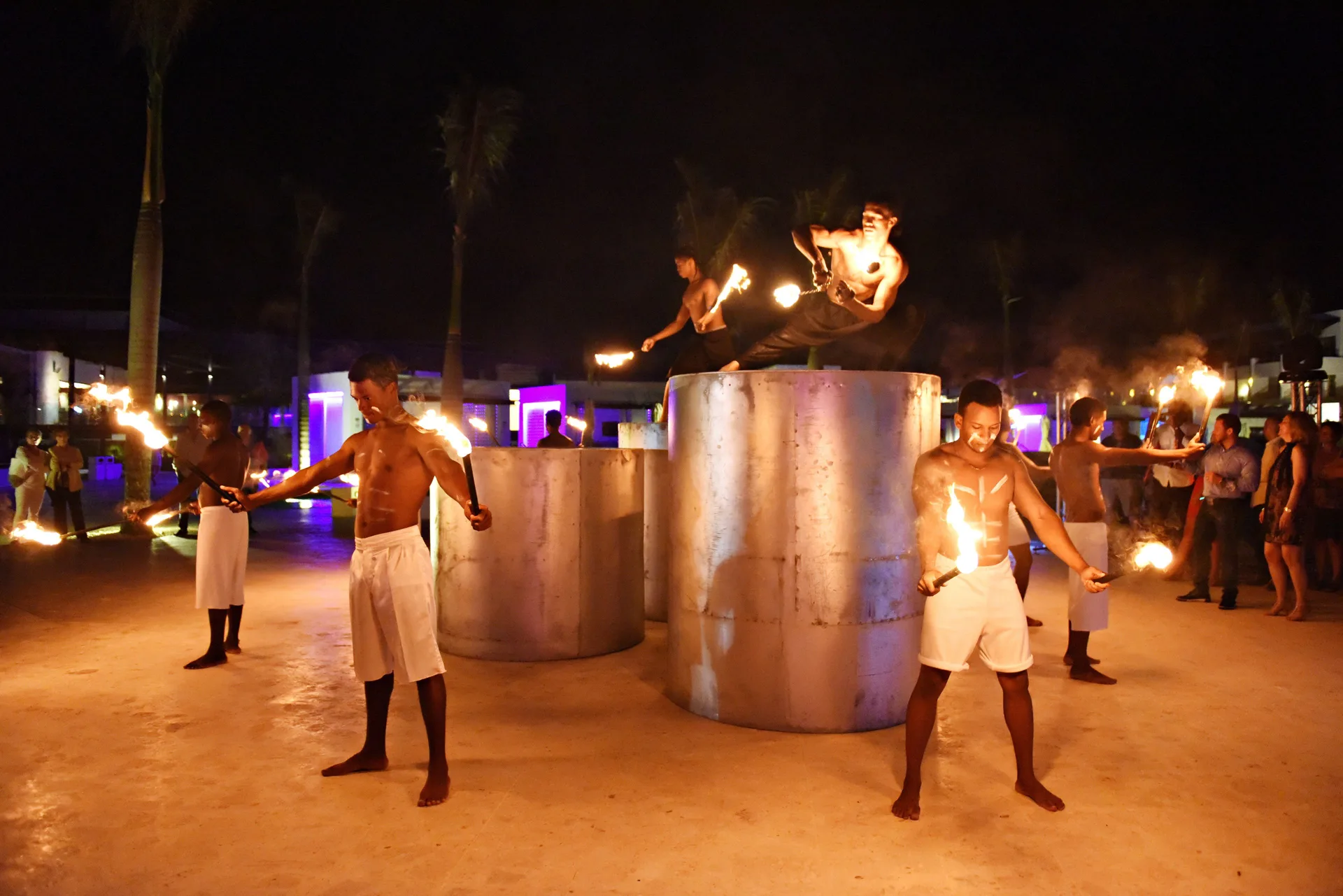 Fire performers entertain at night at Royalton CHIC Punta Cana Resort & Casino.