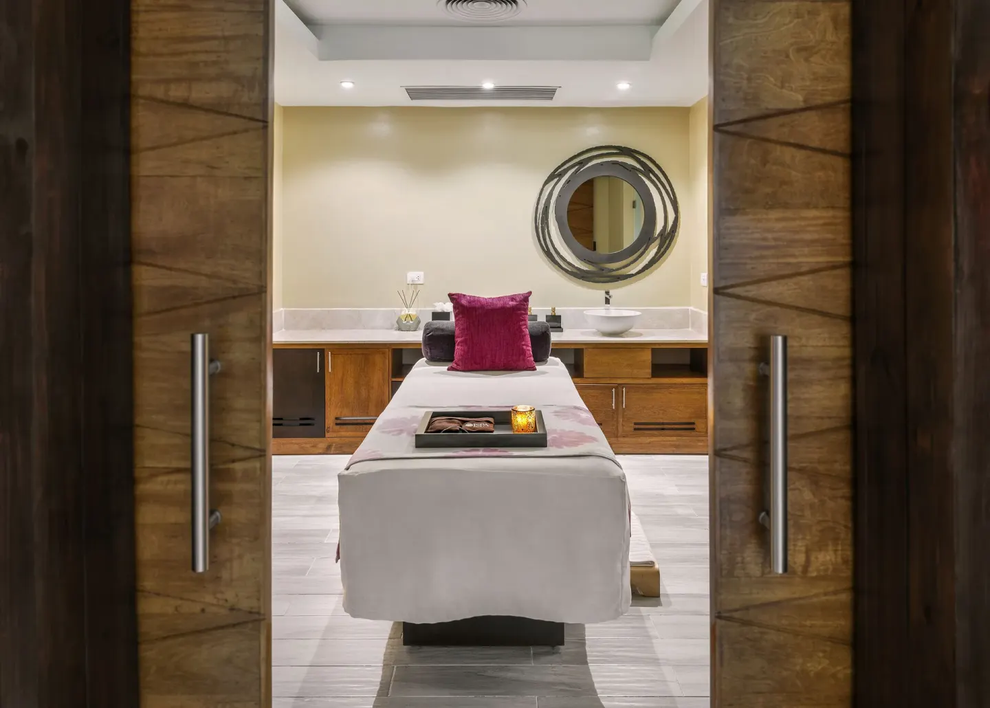 Private spa treatment room with massage bed at Royalton CHIC Punta Cana Resort & Casino.