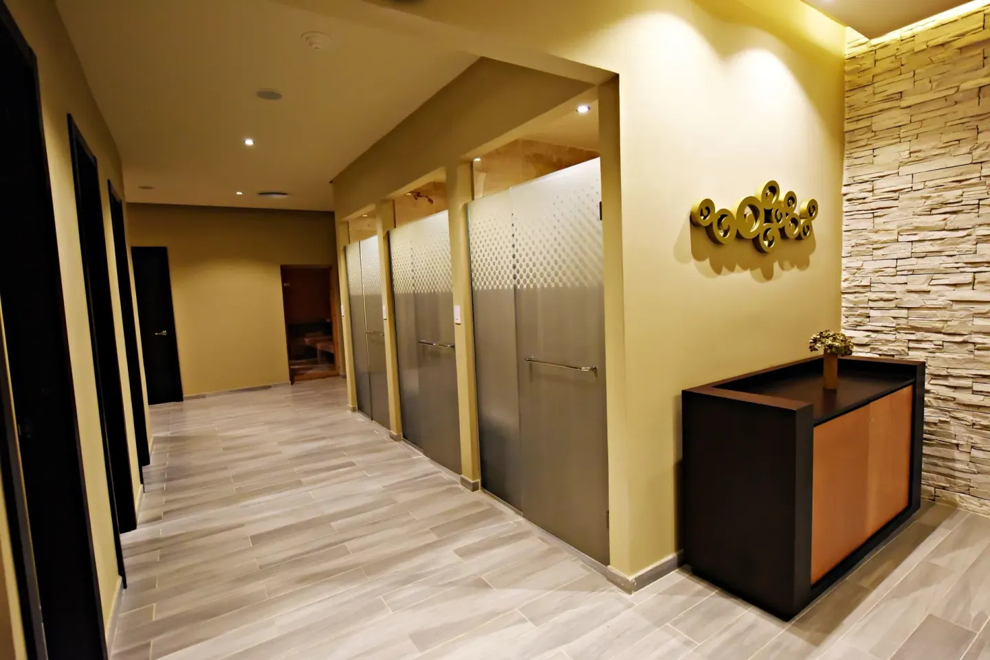 Spa corridor with frosted glass doors at Royalton CHIC Punta Cana Resort & Casino.