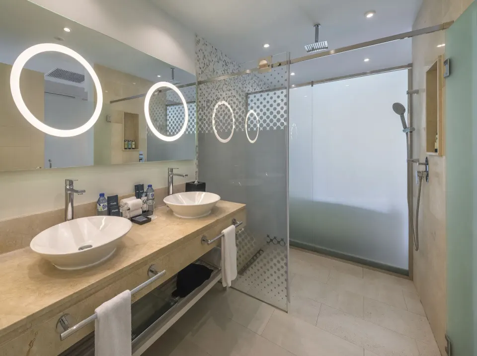 Luxury Junior Suite double vanity and glass shower at Royalton CHIC Punta Cana Resort & Casino.