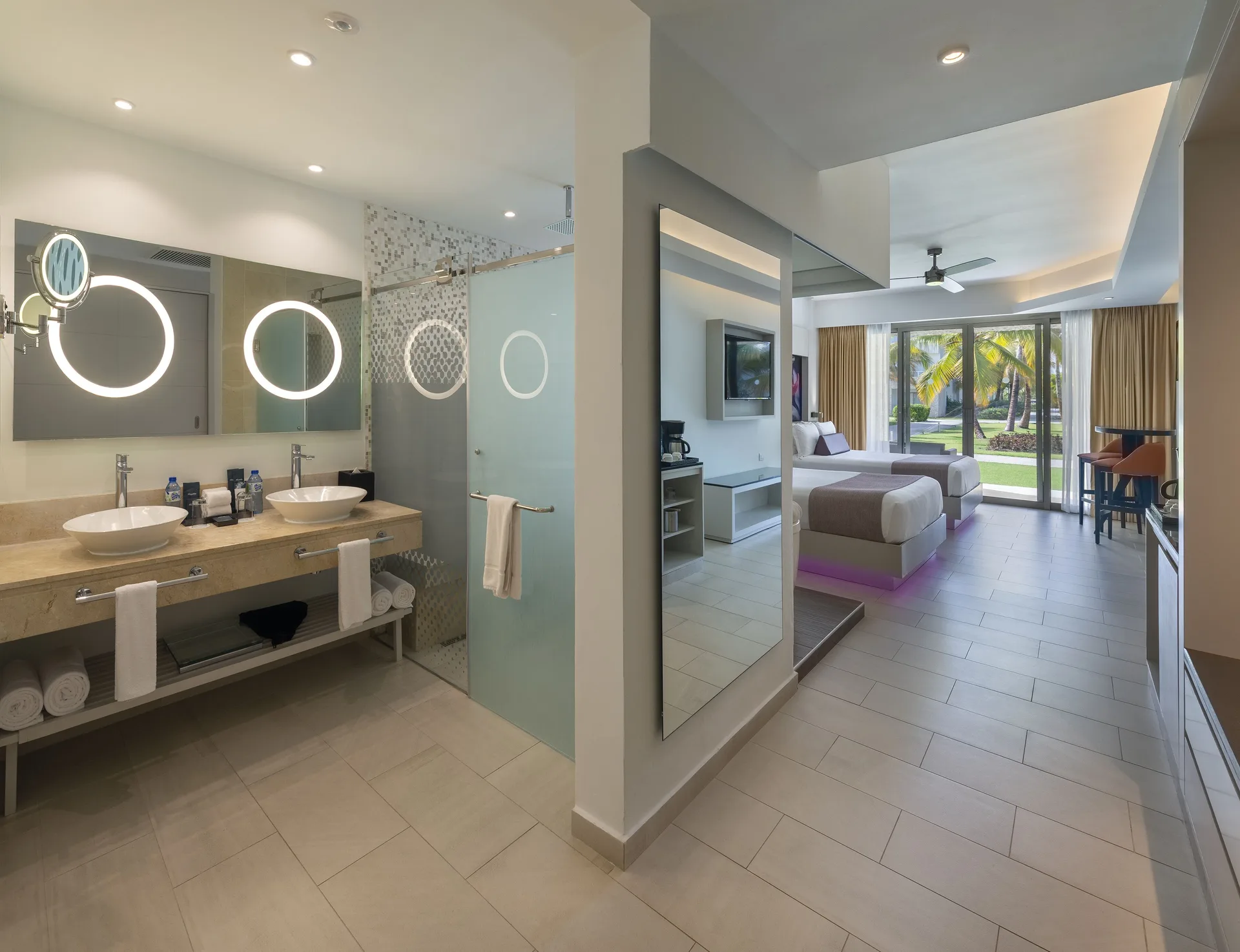 Luxury Junior Suite bathroom and double beds at Royalton CHIC Punta Cana Resort & Casino.