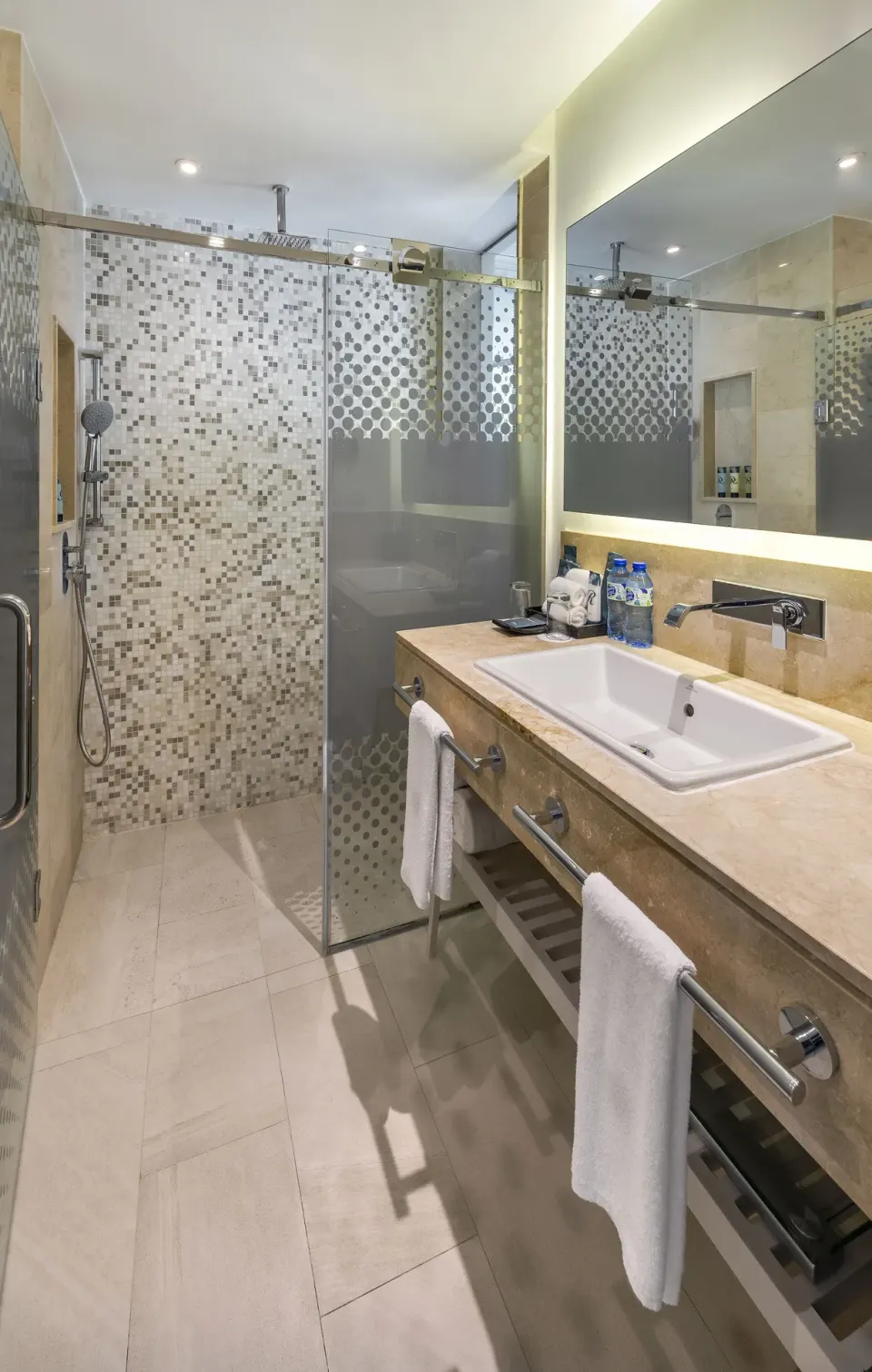 Luxury Room bathroom with glass shower at Royalton CHIC Punta Cana Resort & Casino.