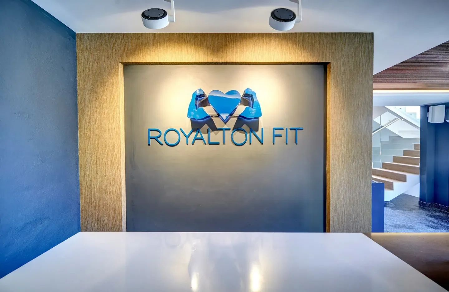 Royalton Grenada sign on a wall at the fitness center entrance at Royalton Grenada.