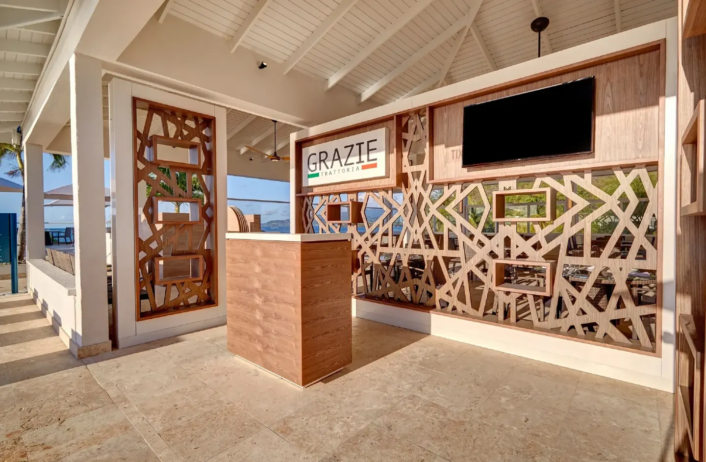 Grazie Italian Trattoria entrance sign and host stand at Royalton Grenada.