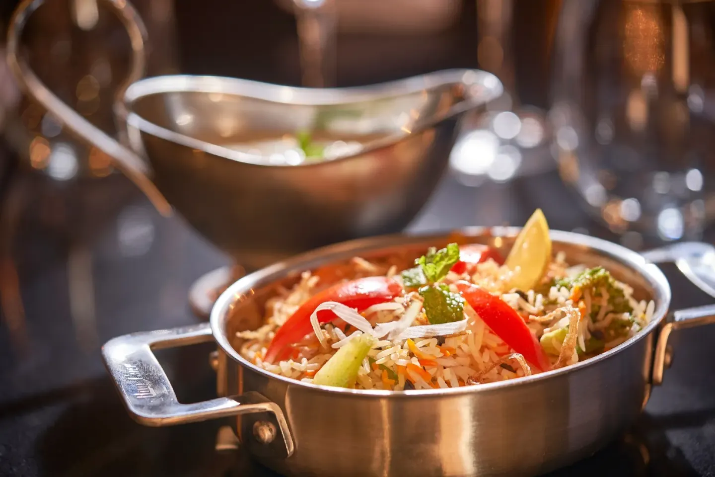 Rice dish with vegetables served in a metal pan at Royalton Grenada.