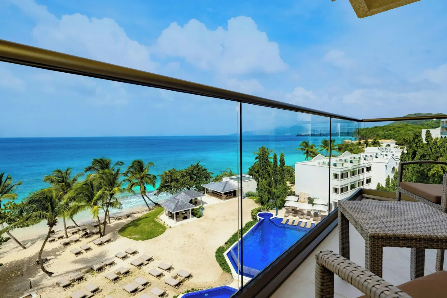 Oceanfront balcony view from a Luxury Junior Suite Ocean Front Diamond Club at Royalton Grenada.