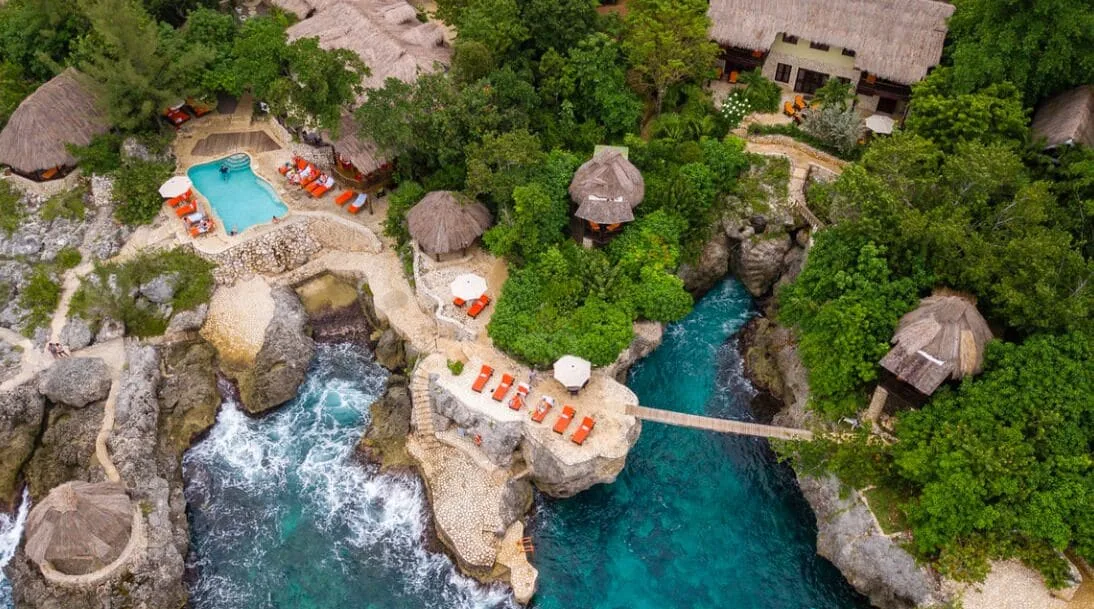 Tensing Pen Hotel boutique cliffside resort in Negril Jamaica with rustic cottages and dramatic ocean cliff views.
