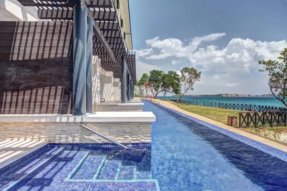 Luxury Junior Suite Swim Out pool beside guest terraces at Royalton Hideaway Negril.