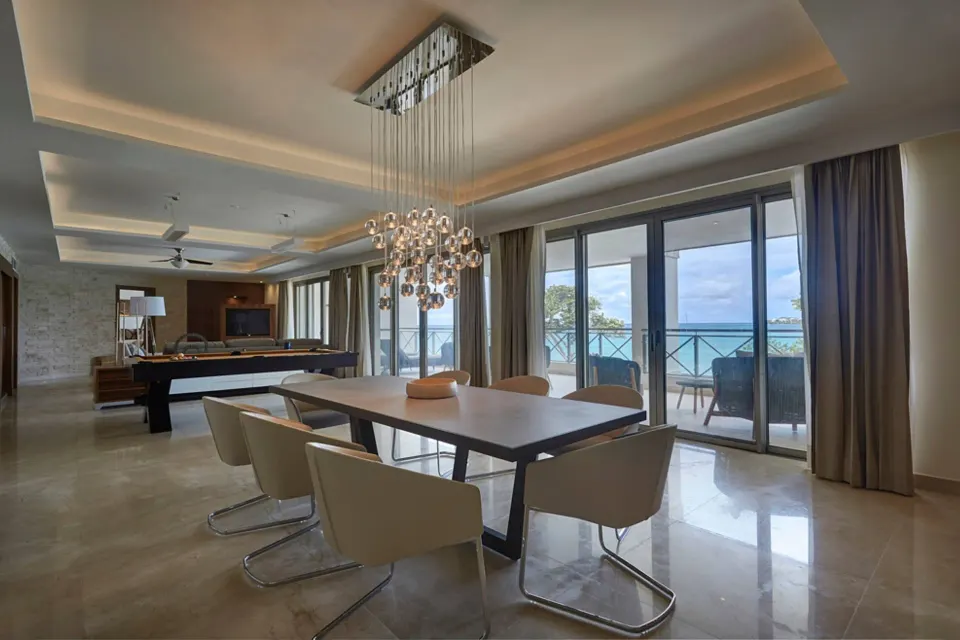 Penthouse dining area with billiards table and sea view at Royalton Hideaway Negril.