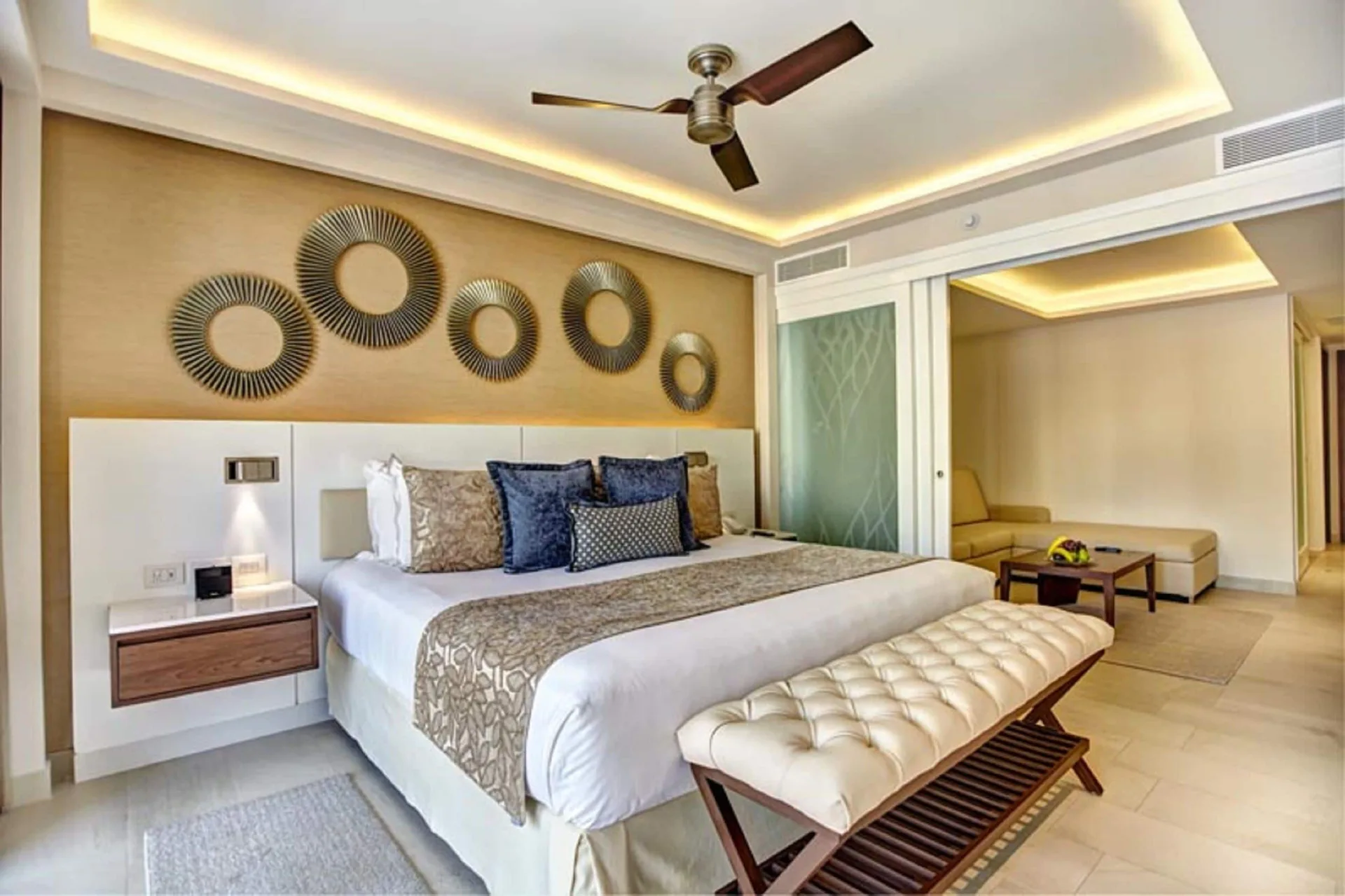 Penthouse king bedroom with sitting area at Royalton Hideaway Negril.