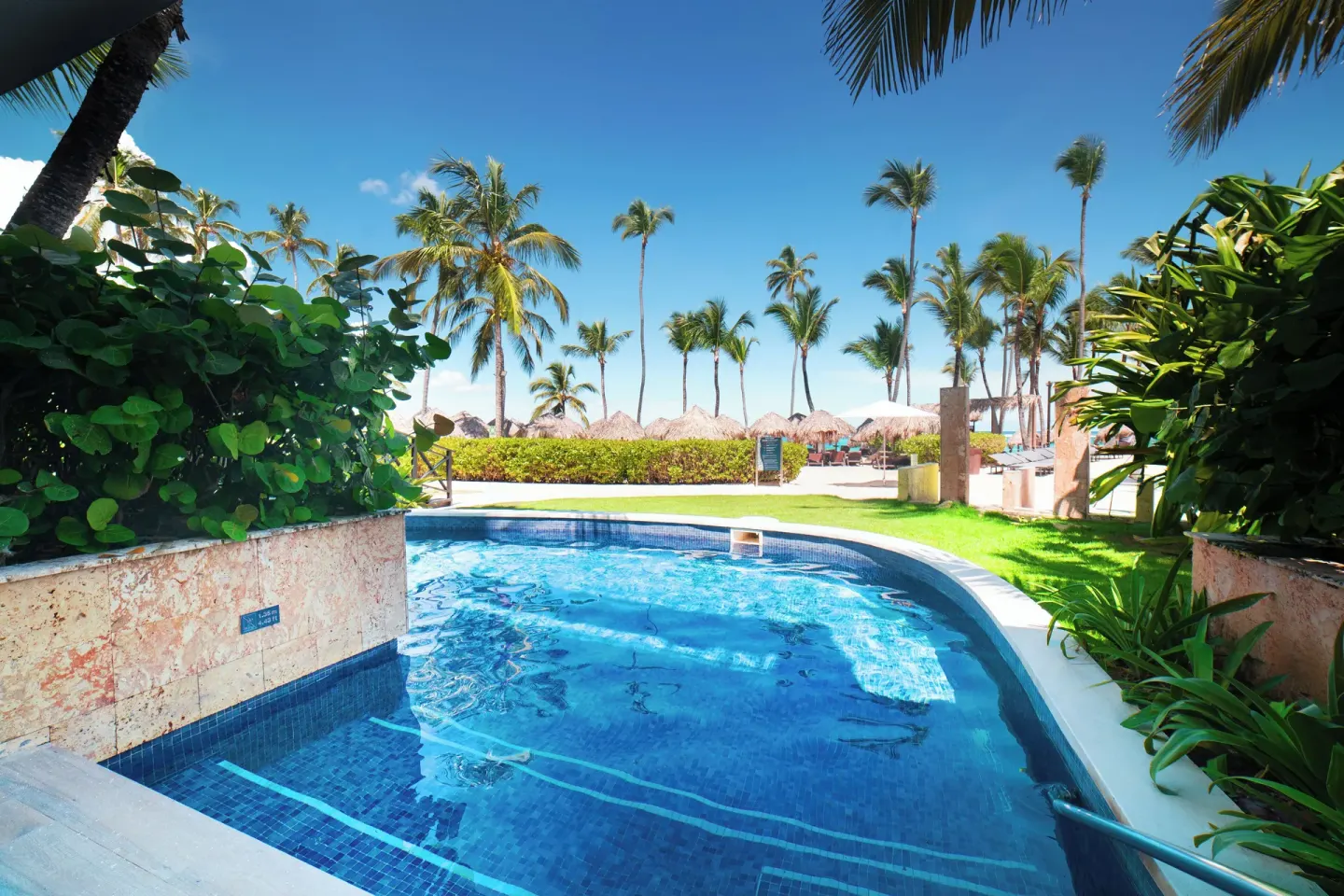 Small curved pool near the beach at Royalton Hideaway Punta Cana Resort & Casino.