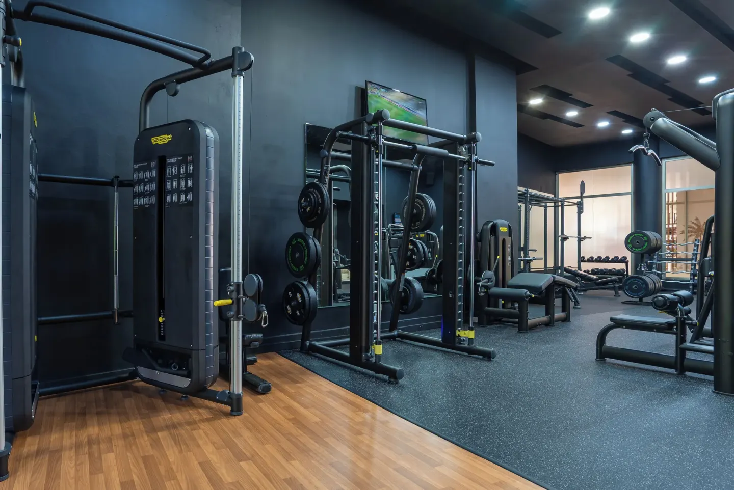 Fitness room with cable machines and free weights at Royalton Hideaway Punta Cana Resort & Casino.