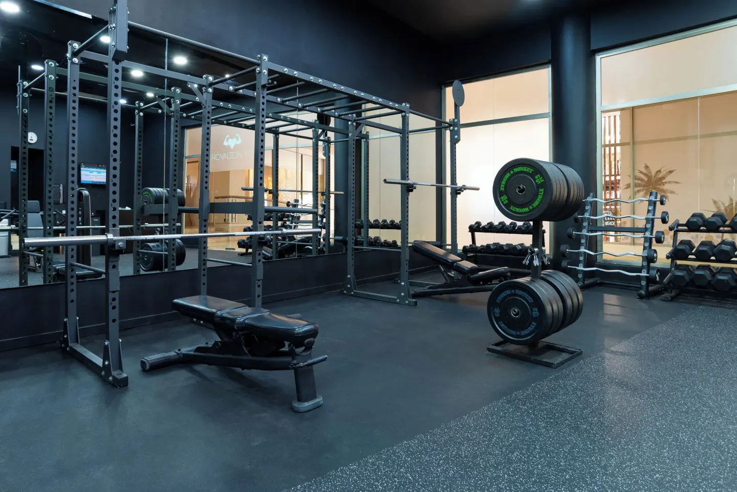 Fitness room with weight racks and benches at Royalton Hideaway Punta Cana Resort & Casino.