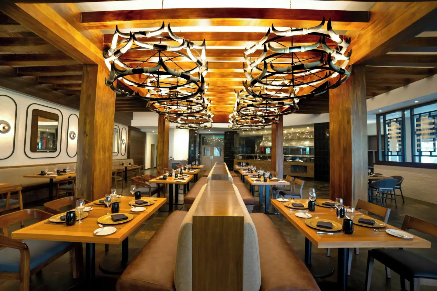 Wood-accented restaurant dining room at Royalton Hideaway Punta Cana Resort & Casino.
