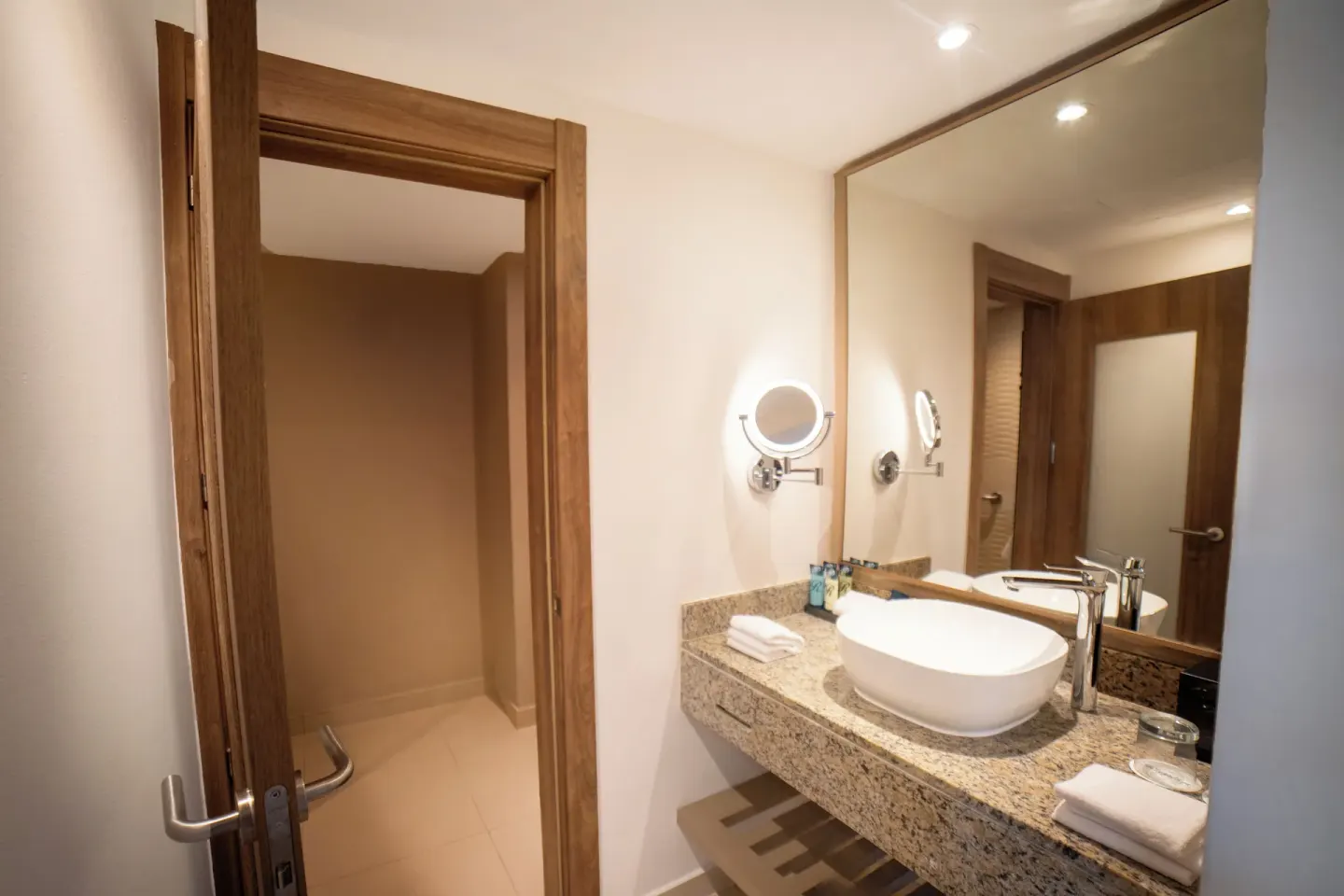Luxury Room bathroom vanity and mirror at Royalton Hideaway Punta Cana Resort & Casino.