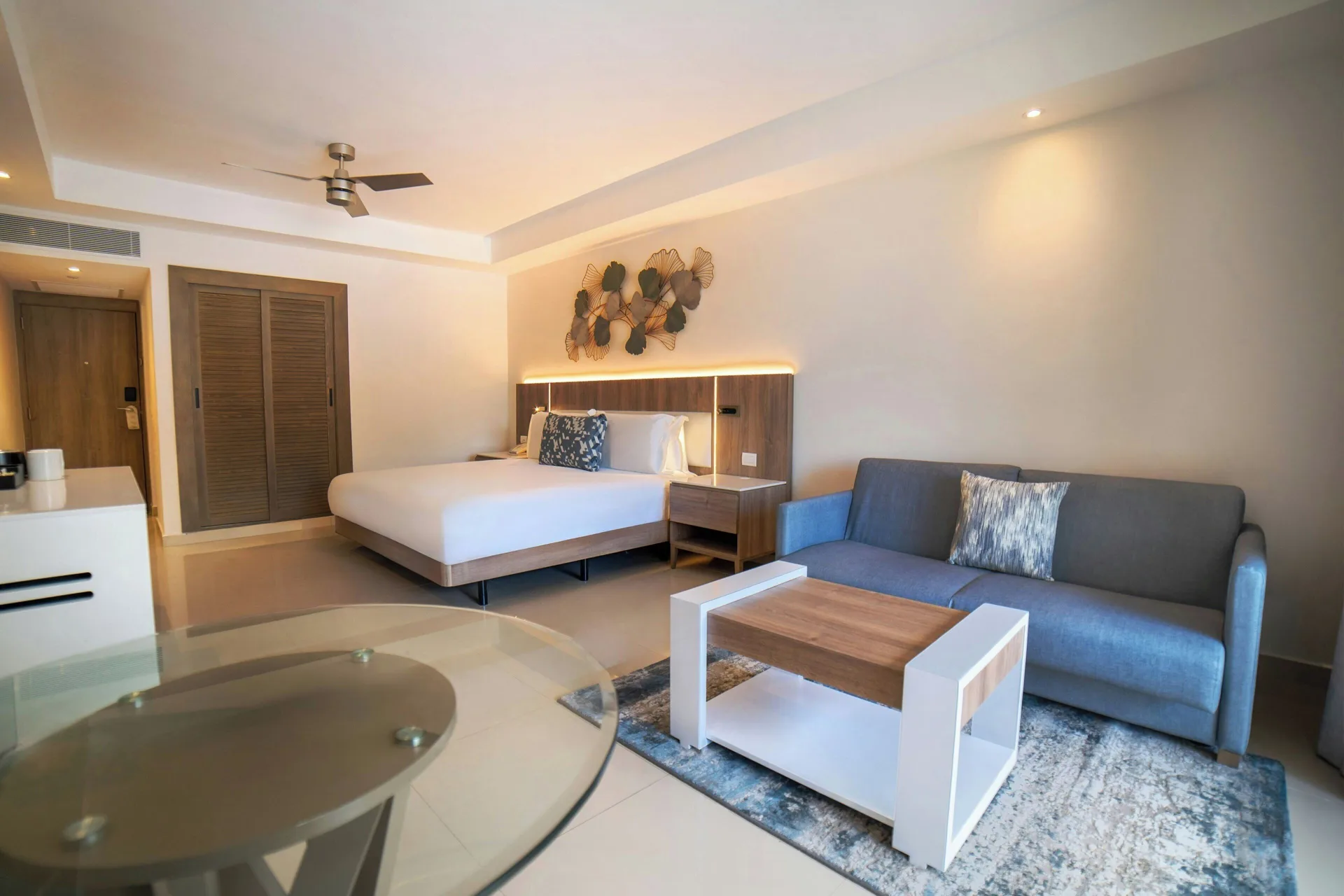 Luxury Room with king bed and sofa at Royalton Hideaway Punta Cana Resort & Casino.