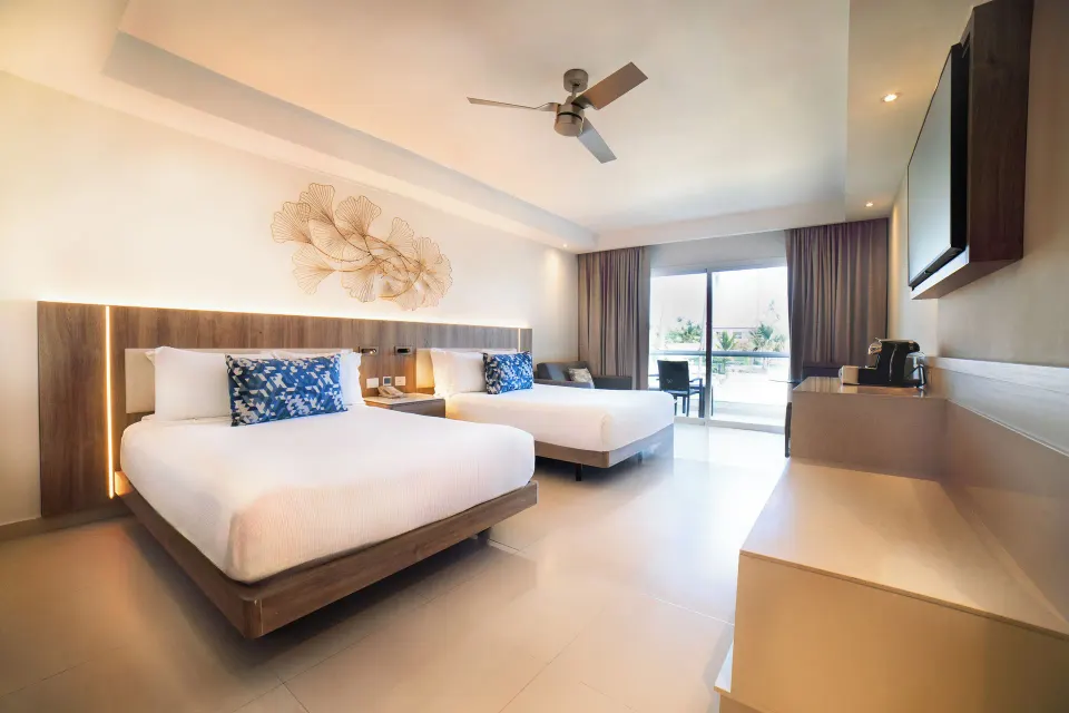 Luxury Room with two beds and balcony light at Royalton Hideaway Punta Cana Resort & Casino.