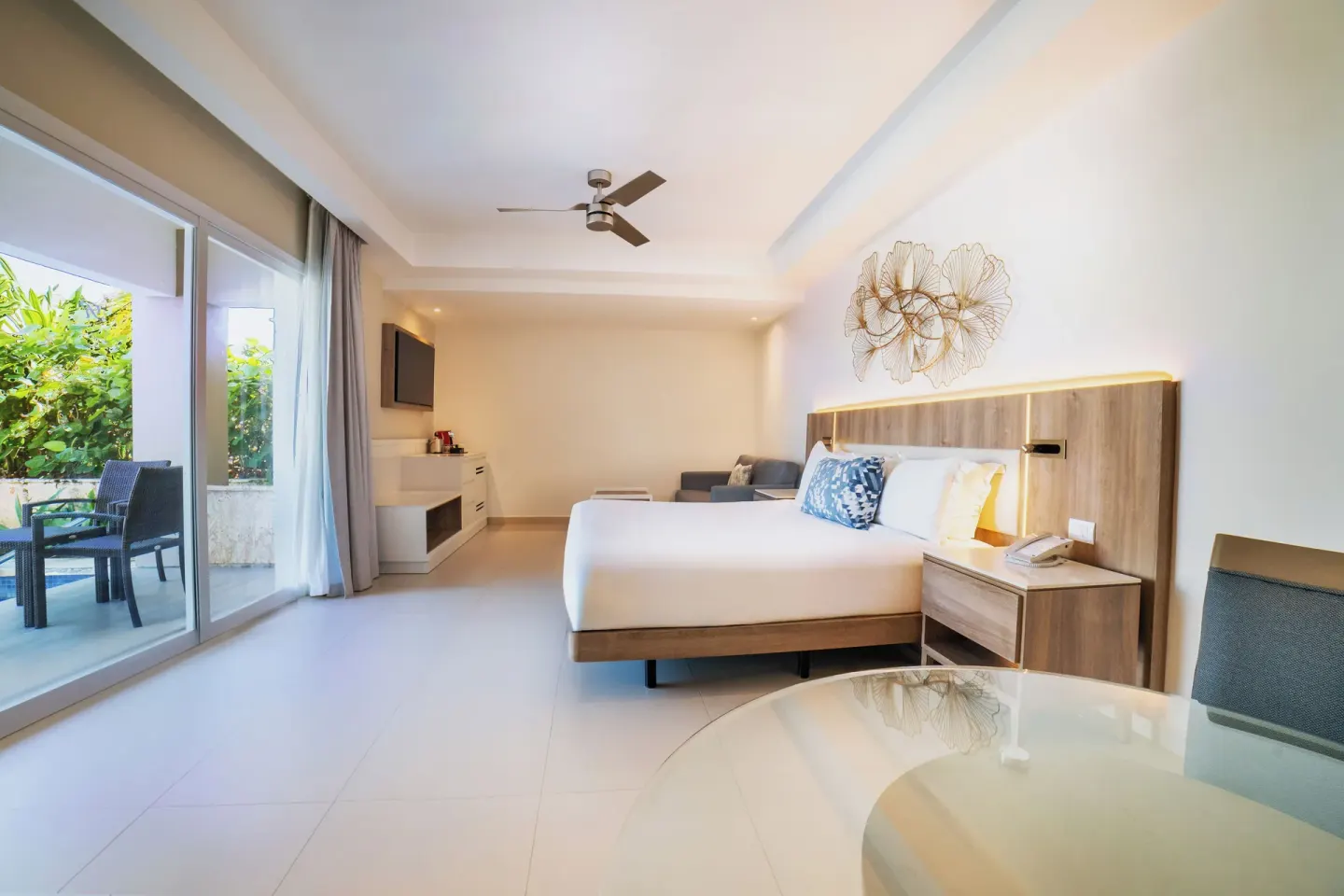 Luxury Swim Out Room with king bed and patio doors at Royalton Hideaway Punta Cana Resort & Casino.