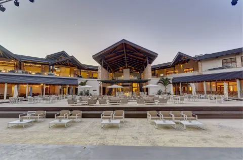 Open-air resort terrace and lounge seating at Royalton Hideaway Saint Lucia.