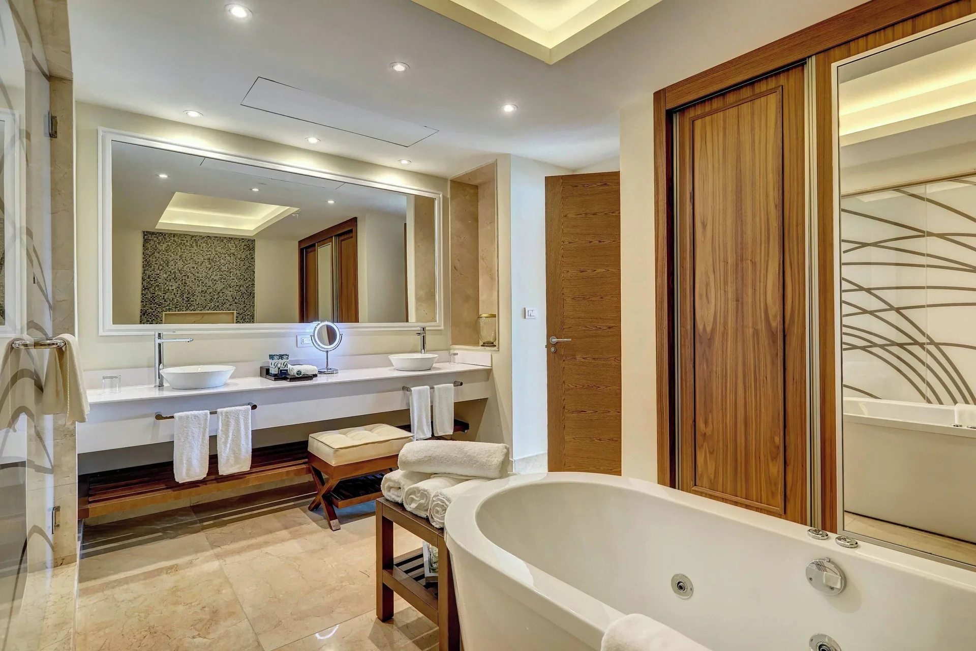 Bathroom with soaking tub and double vanity at Royalton Hideaway Saint Lucia.