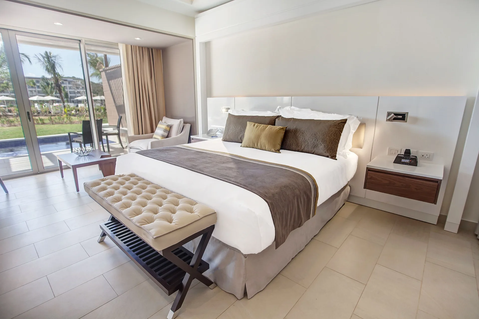 Luxury Junior Suite Swim Out bedroom with king bed at Royalton Hideaway Saint Lucia.
