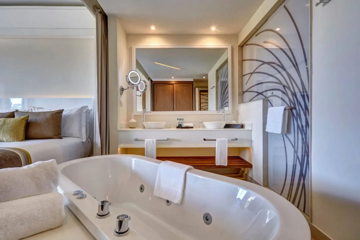 Luxury Junior Suite bath with soaking tub and vanity at Royalton Hideaway Saint Lucia.