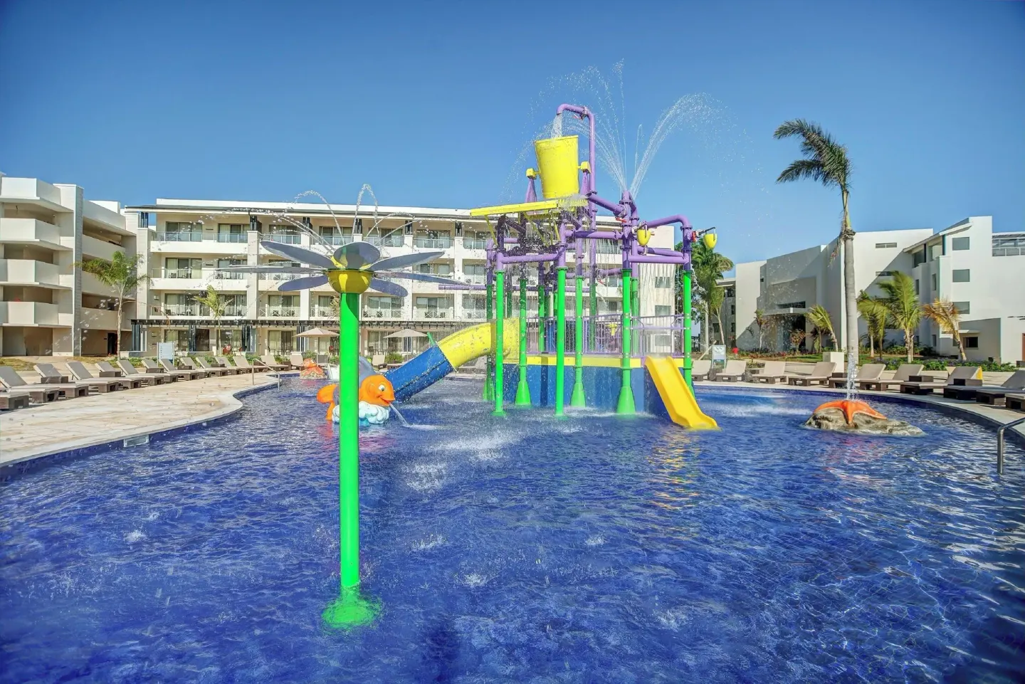 Children’s splash pool with slides and water features at Royalton Negril.