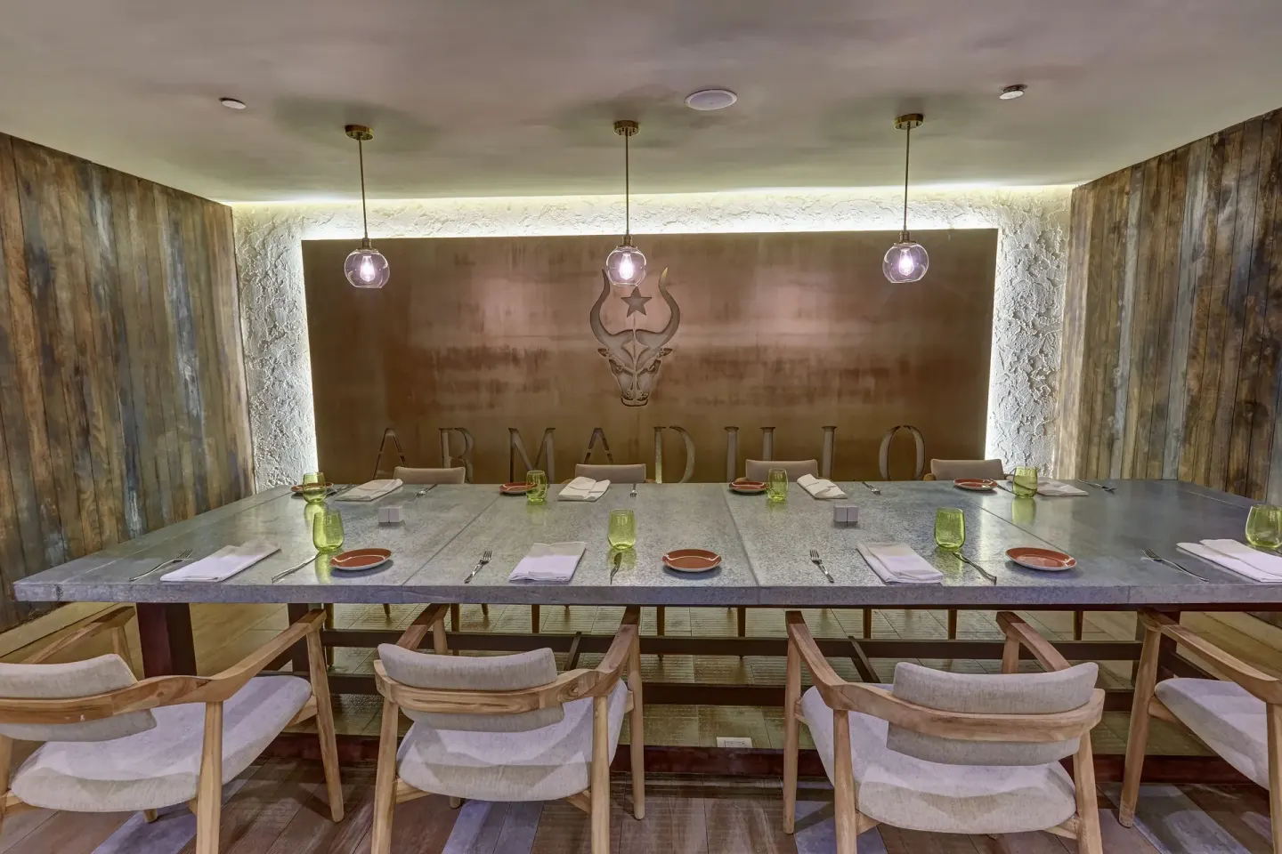 Armadillo private dining table with wood walls at Royalton Negril.