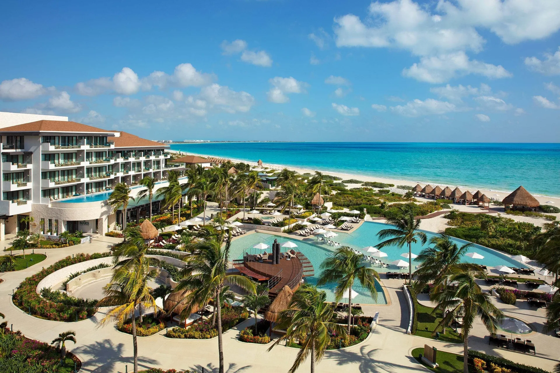 Dreams Playa Mujeres Golf & Spa Resort family all-inclusive resort with water park, golf and beachfront pools