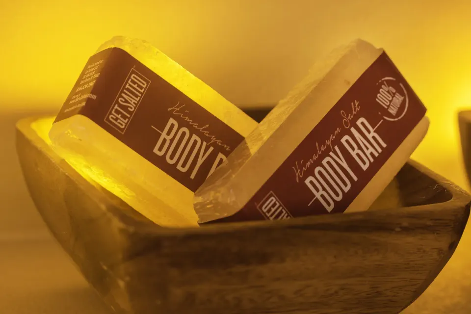 Salt body bars displayed in a wooden bowl at Royalton Splash Riviera Cancun.