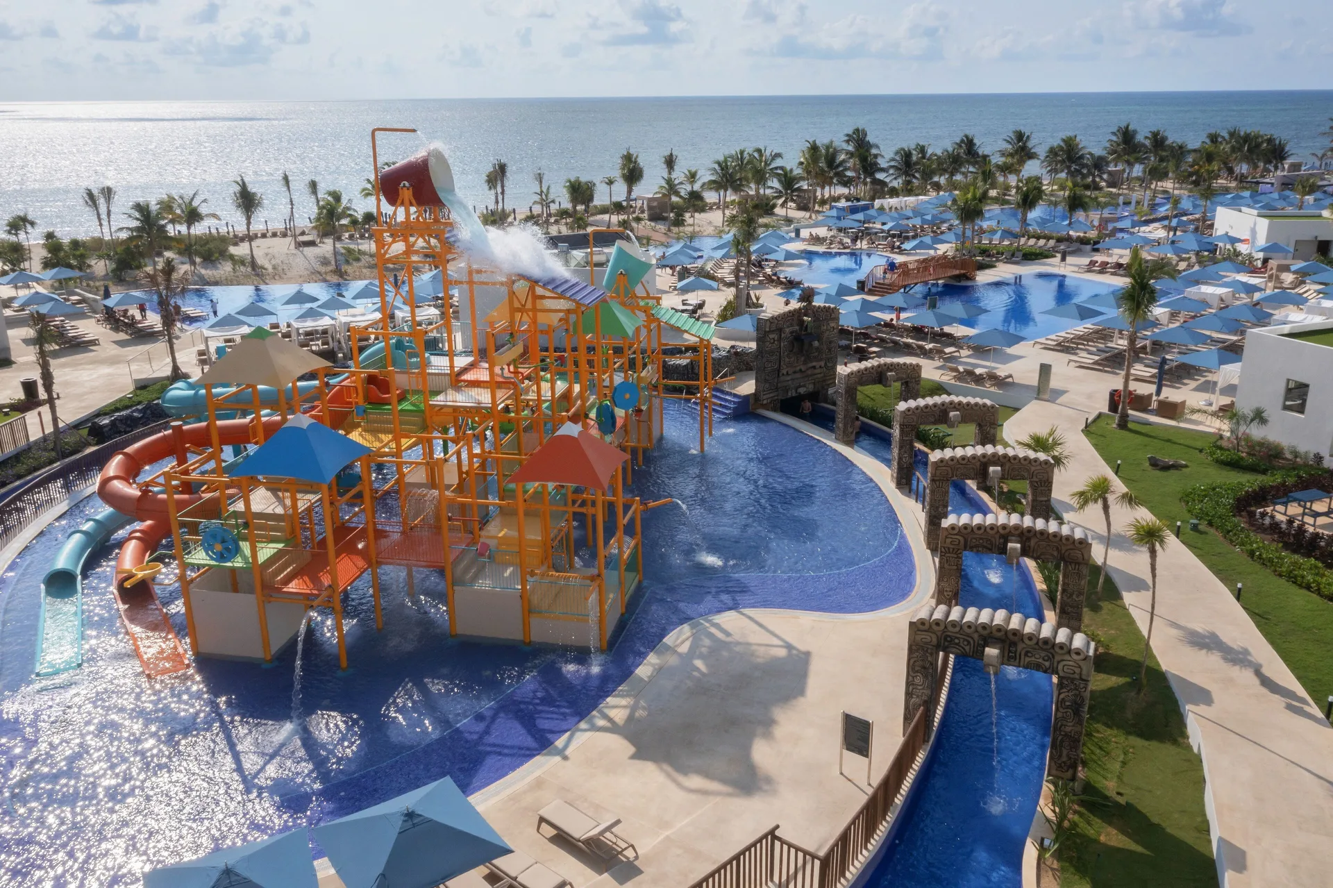 Aerial view of the water play area and beach at Royalton Splash Riviera Cancun.
