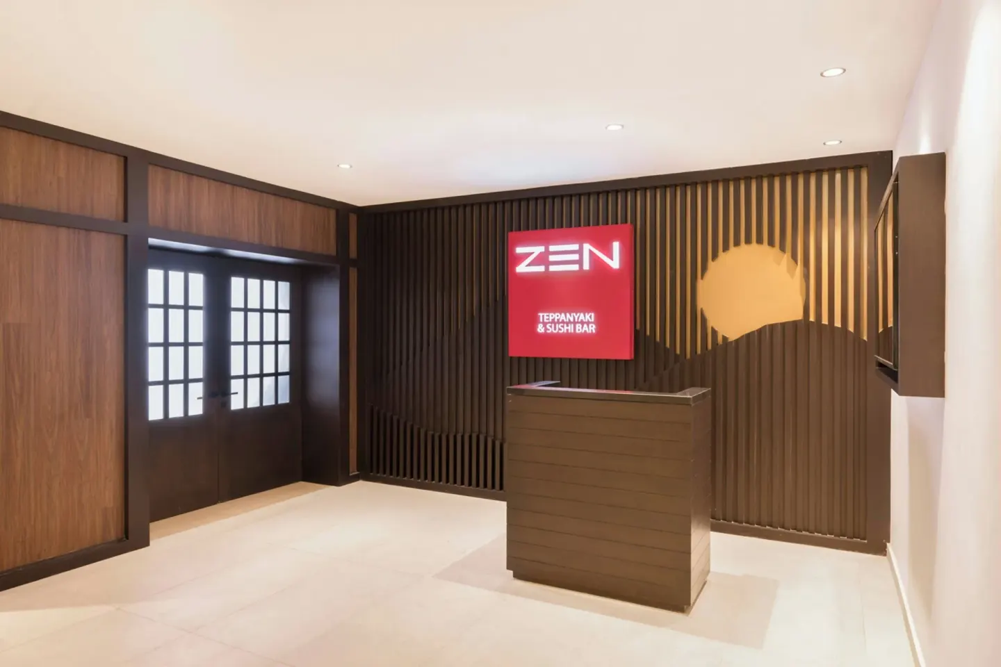 Zen entrance at Royalton Splash Riviera Cancun with a sign for teppanyaki and sushi bar.