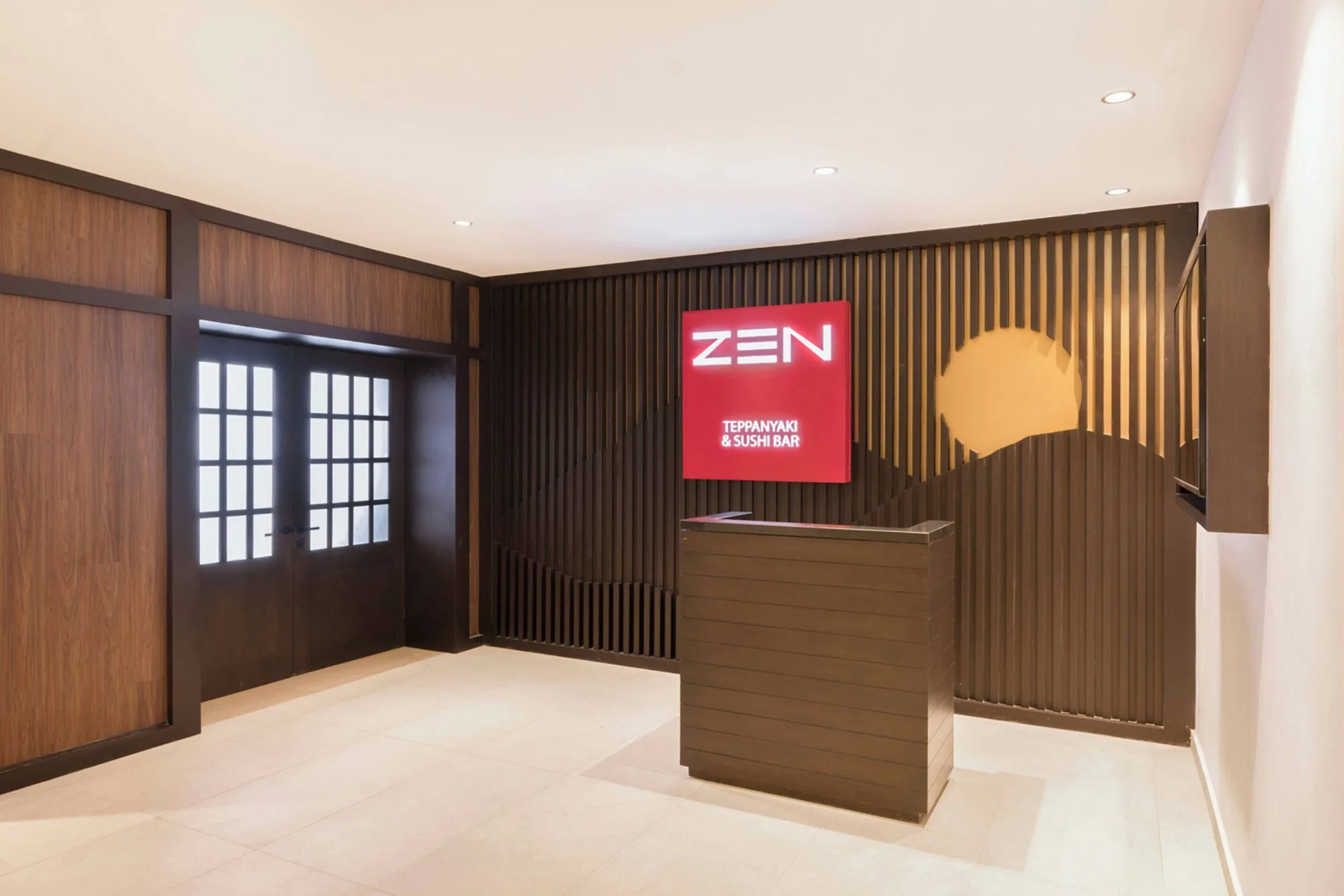 Zen entrance at Royalton Splash Riviera Cancun with a sign for teppanyaki and sushi bar.