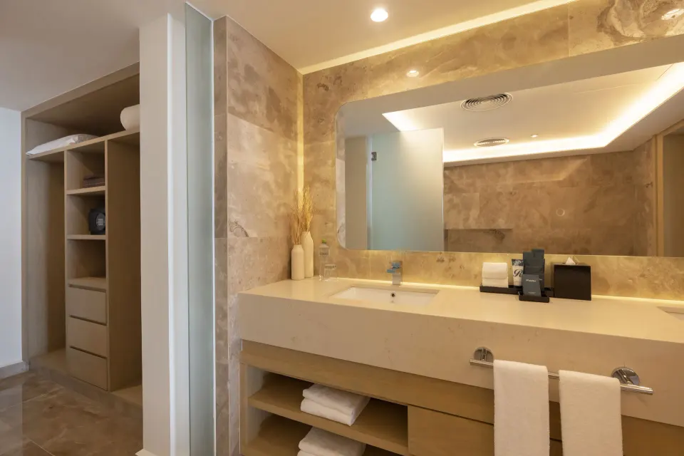 Vanity and open closet in a Luxury Junior Suite at Royalton Splash Riviera Cancun.