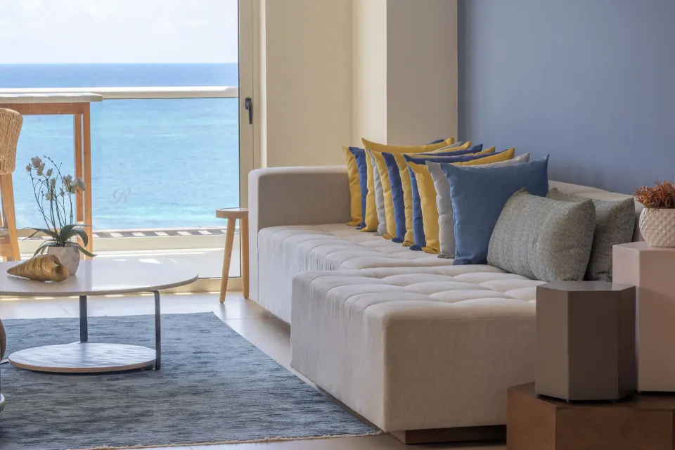 Living area sofa facing the ocean at Royalton Splash Riviera Cancun.