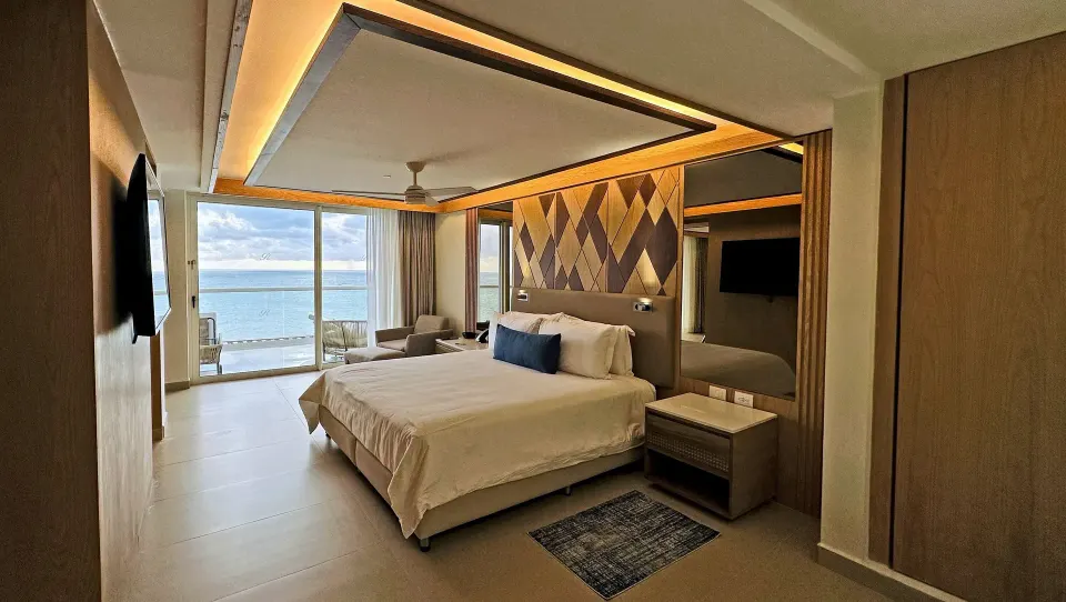 Oceanfront king bedroom in a sky suite at Royalton Splash Riviera Cancun.