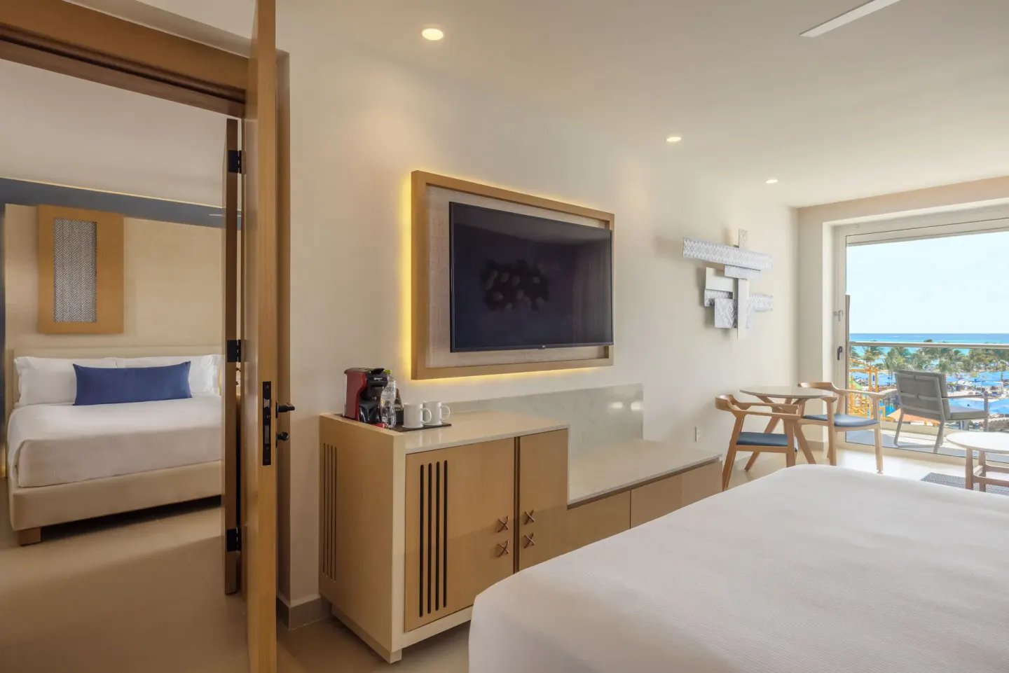 Two Bedroom Luxury Junior Suite with ocean-view balcony at Royalton Splash Riviera Cancun.