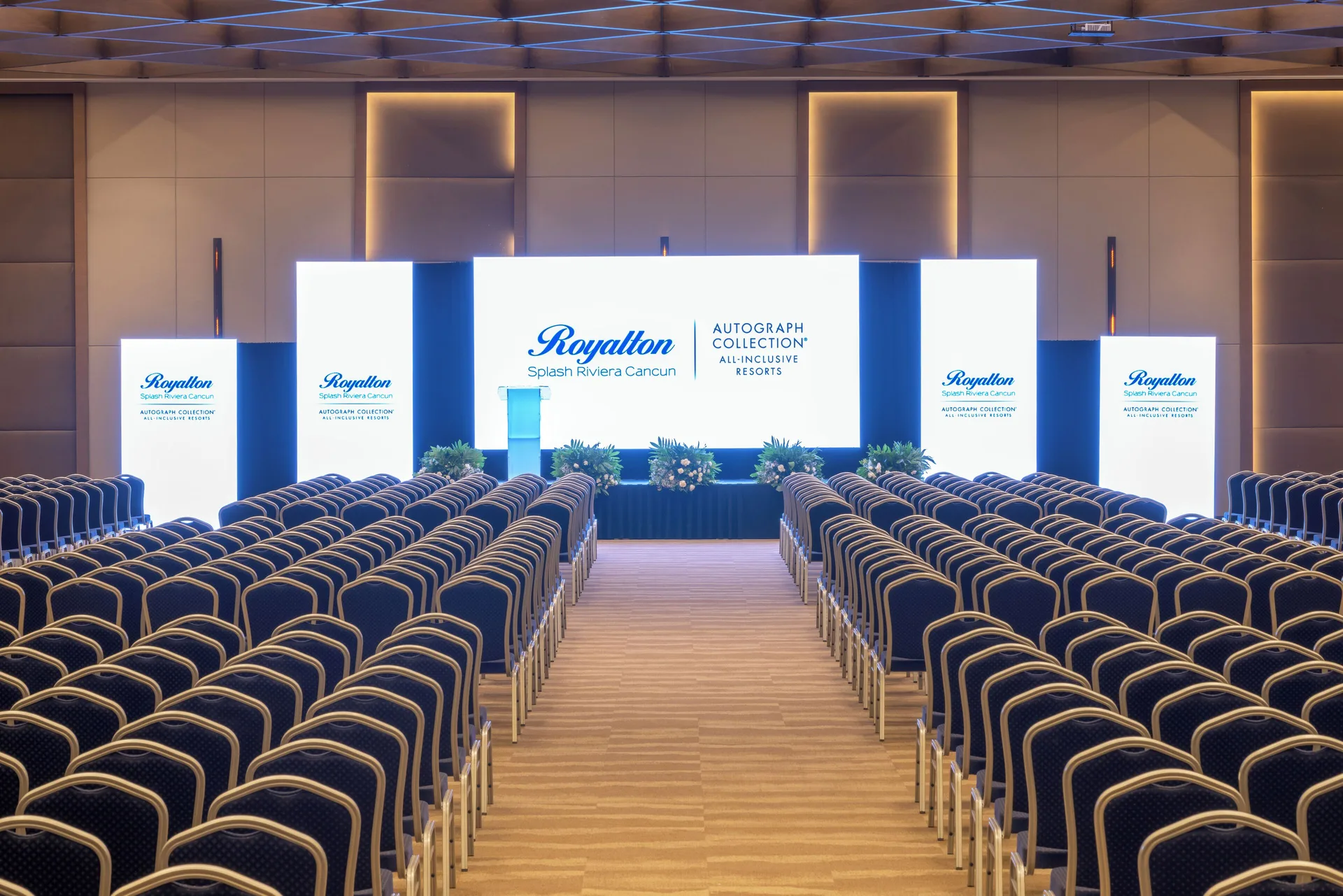 Conference seating and presentation stage at Royalton Splash Riviera Cancun.