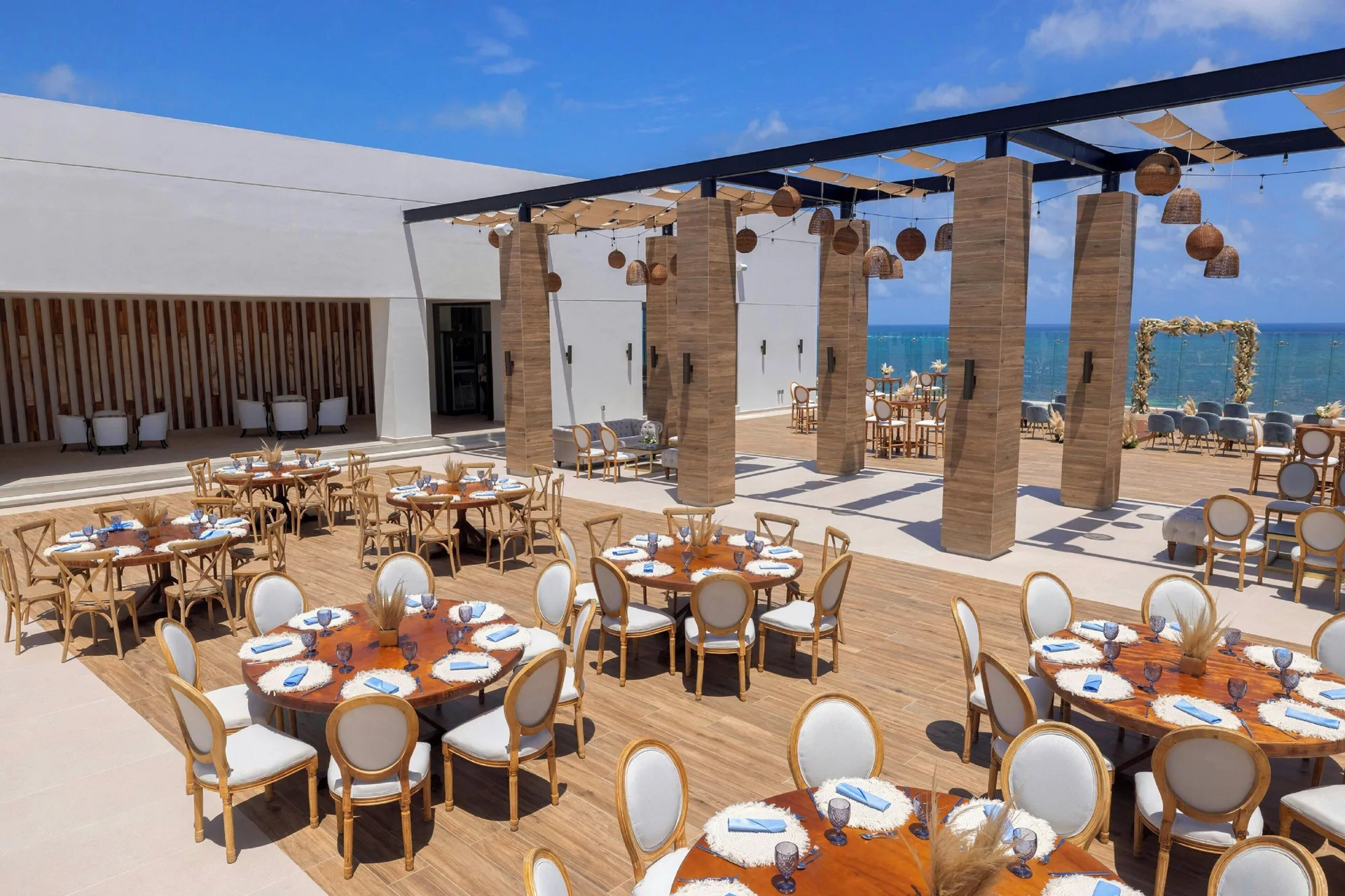 Oceanfront terrace dining setup at Royalton Splash Riviera Cancun.