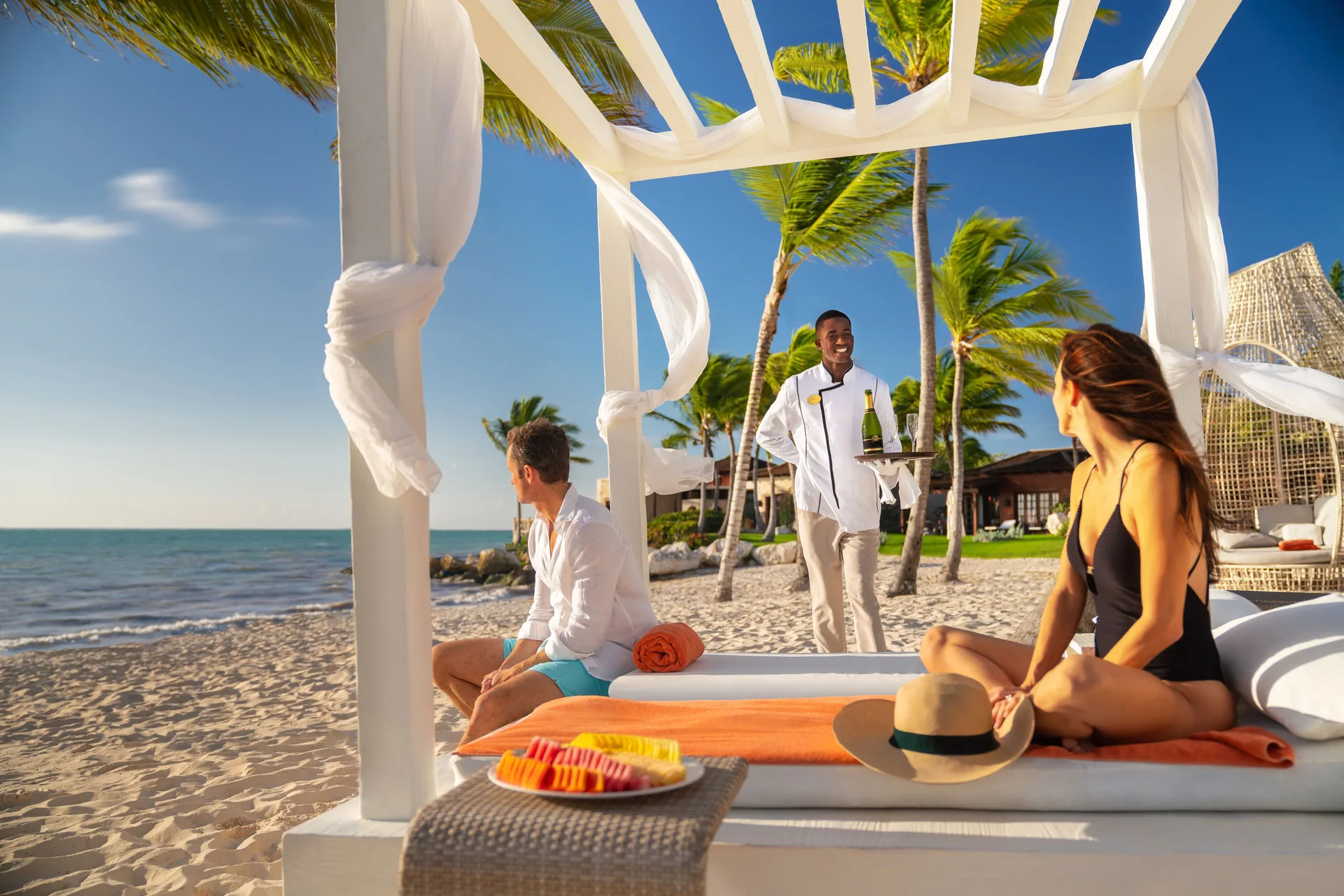 Beach cabana service on the sand at Sanctuary Cap Cana, a Luxury Collection Resort.