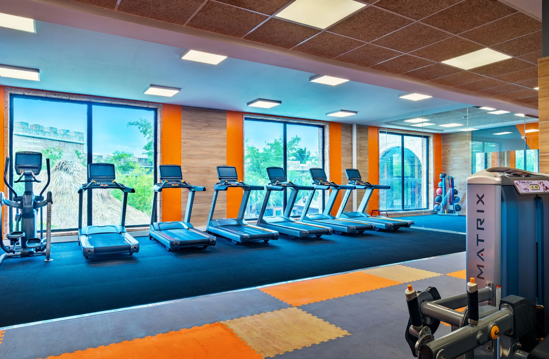 Fitness center treadmills and weight equipment at Sanctuary Cap Cana, a Luxury Collection Resort.