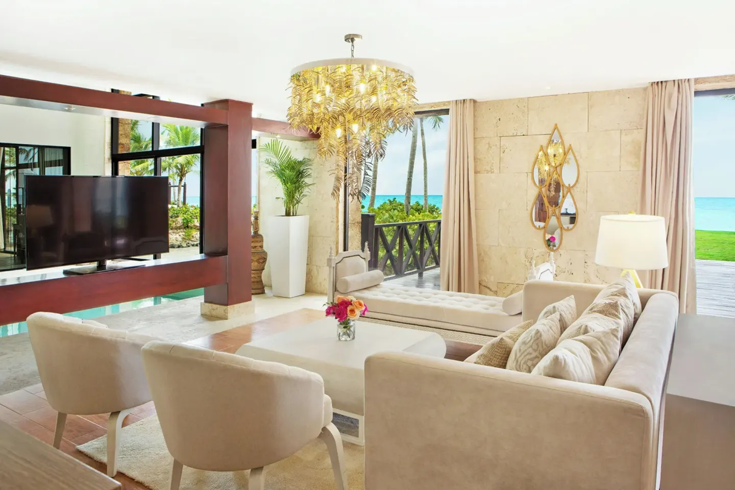 Suite living room with ocean views at Sanctuary Cap Cana, a Luxury Collection Resort.
