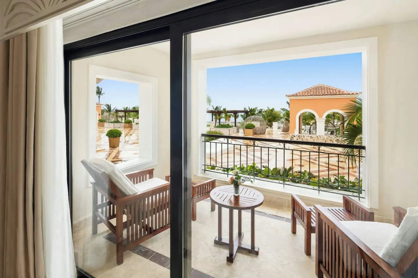 Furnished Junior Suite balcony at Sanctuary Cap Cana, a Luxury Collection Resort.