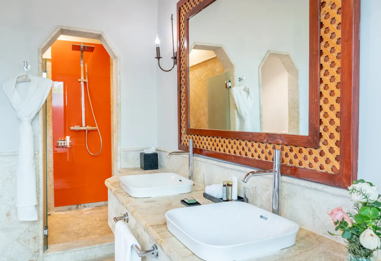 Villa garden view bathroom vanity and shower at Sanctuary Cap Cana, a Luxury Collection Resort.