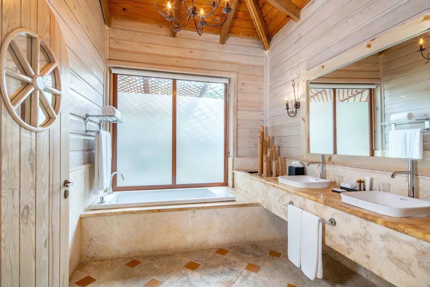 Oceanfront villa bathroom with soaking tub and double vanity at Sanctuary Cap Cana, a Luxury Collection Resort.