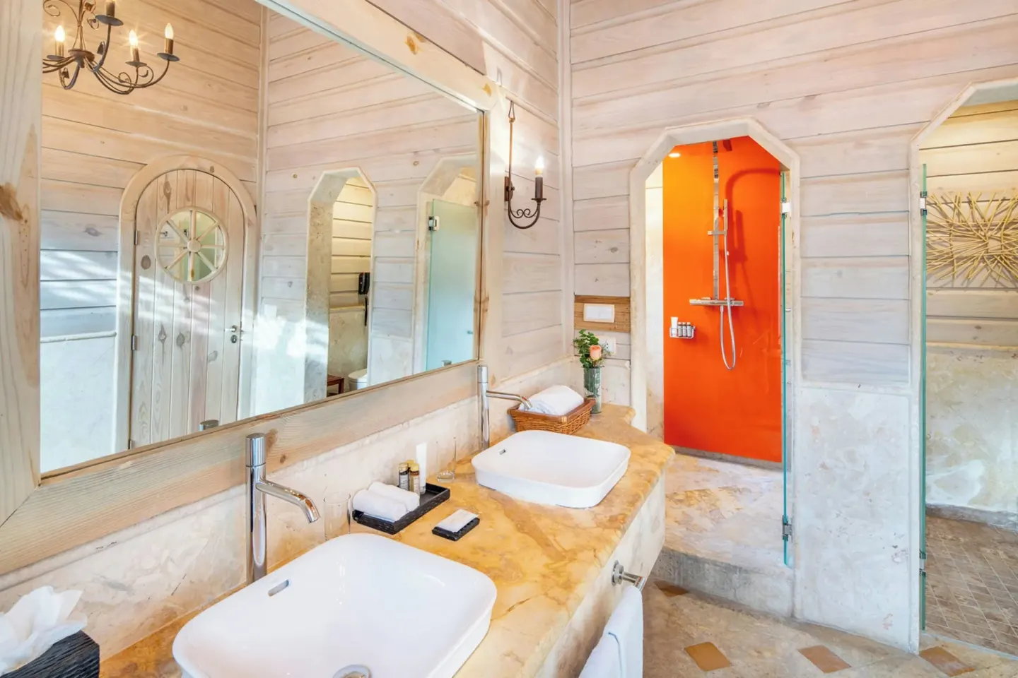 Oceanfront villa bathroom vanity and glass shower at Sanctuary Cap Cana, a Luxury Collection Resort.