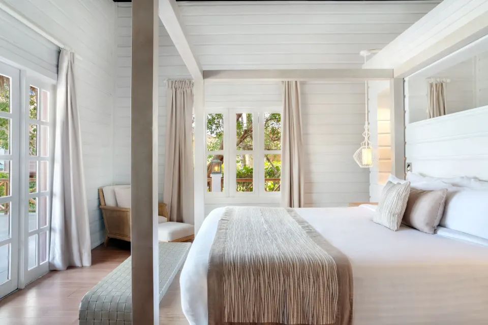 Villa Balcony guest room with four-poster bed at Sanctuary Cap Cana, a Luxury Collection Resort.