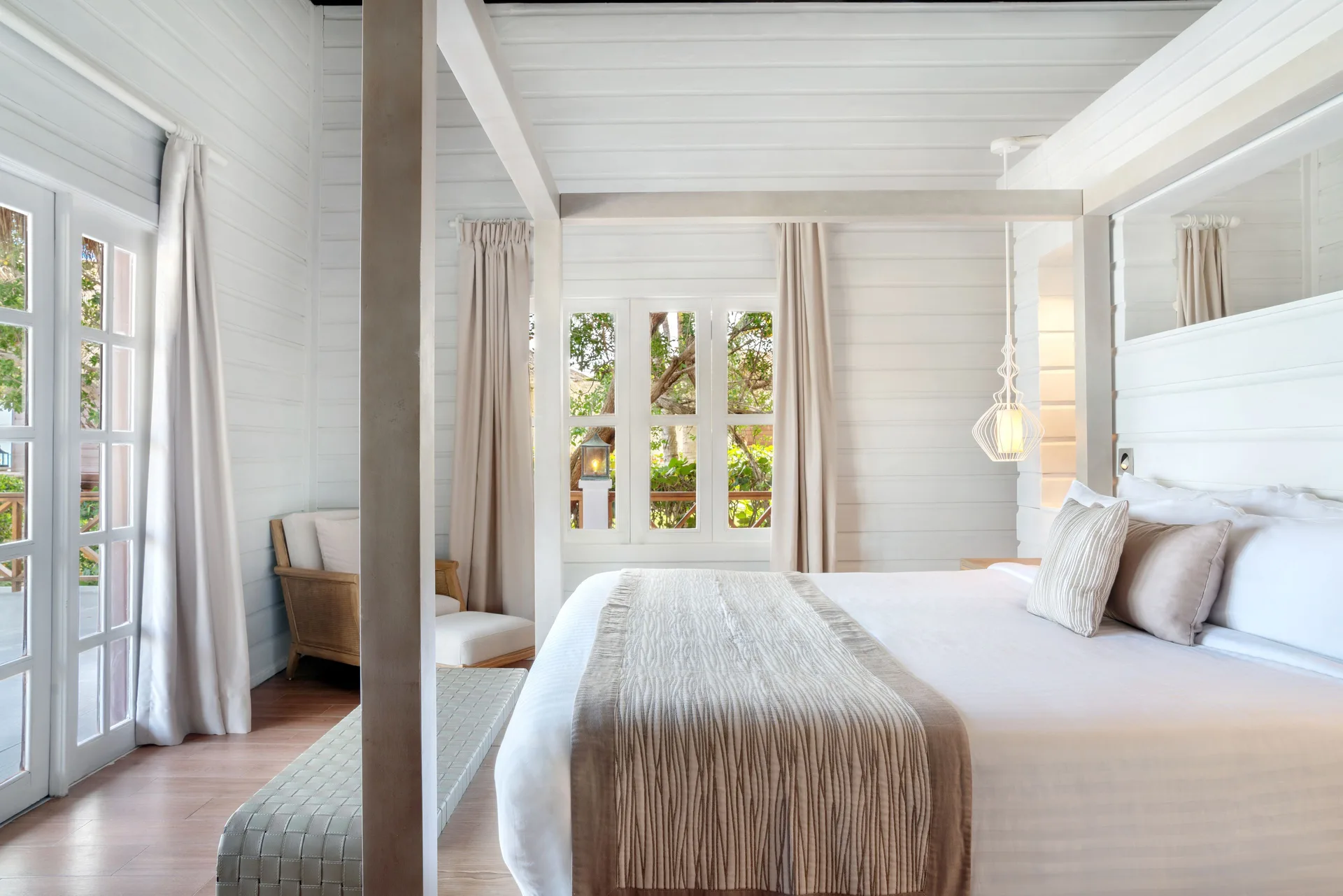 Villa Balcony guest room with four-poster bed at Sanctuary Cap Cana, a Luxury Collection Resort.