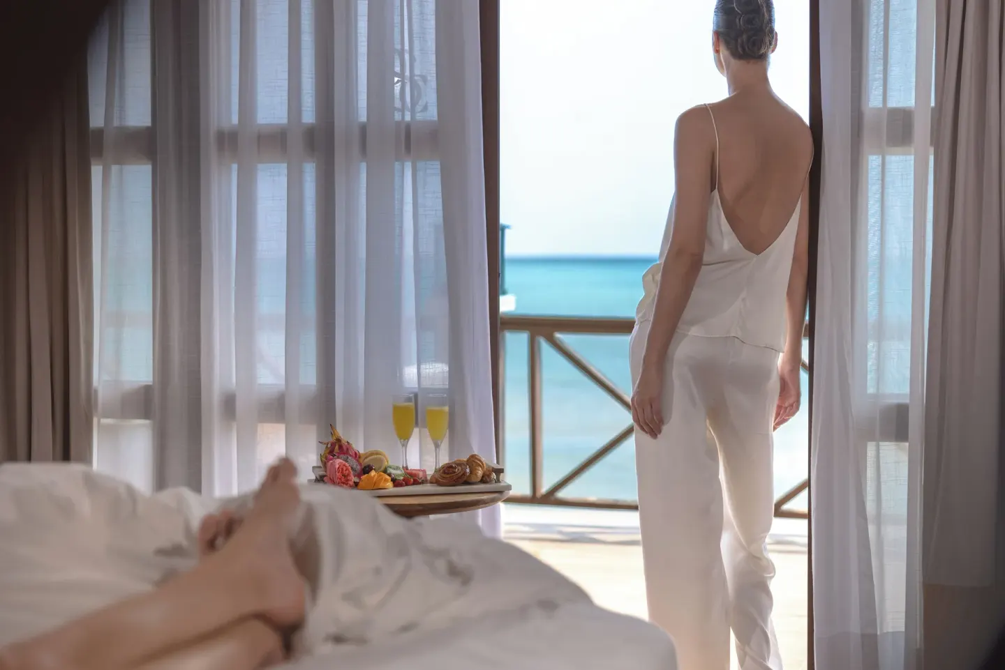Oceanside villa bedroom balcony view at Sanctuary Cap Cana, a Luxury Collection Resort.