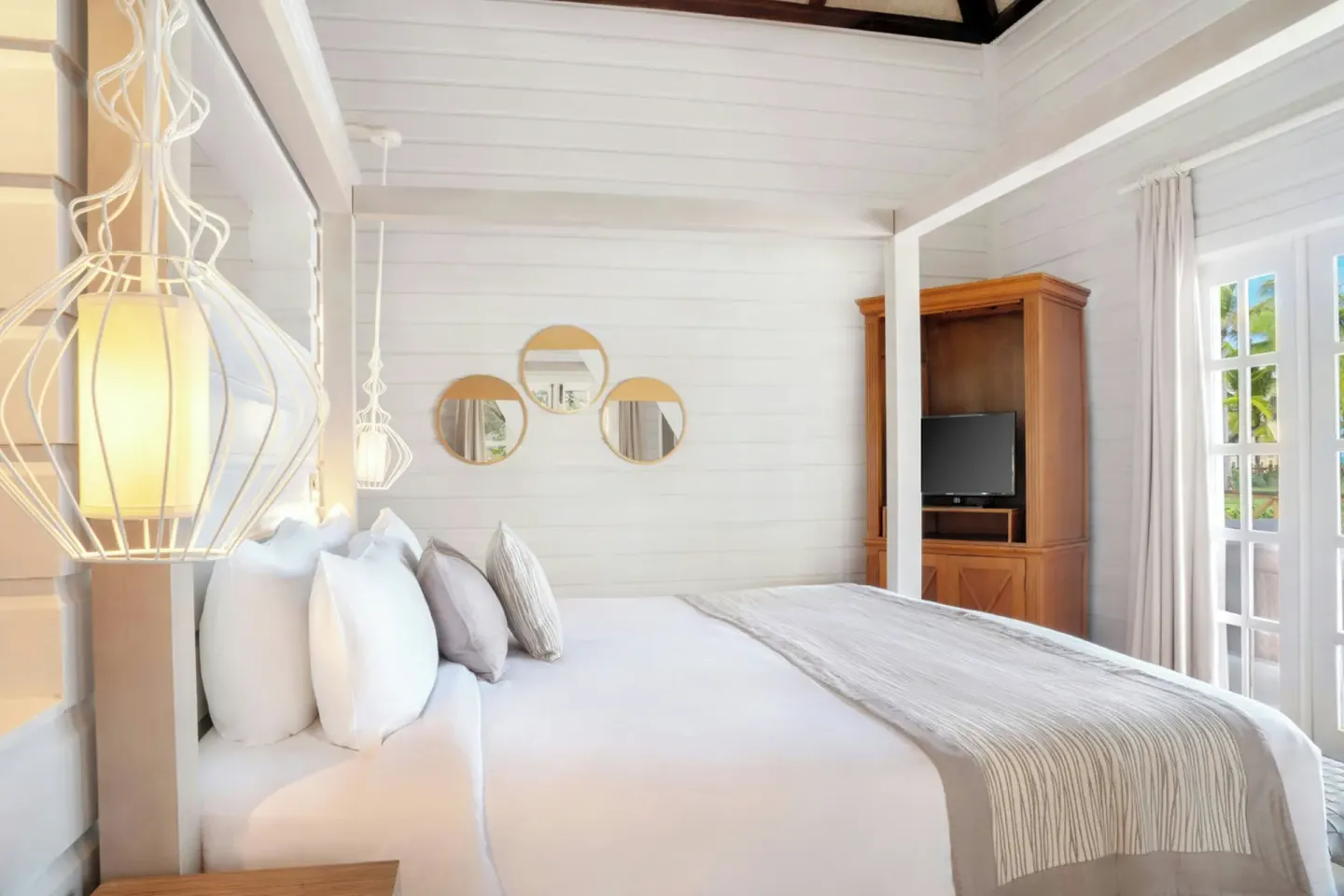 Villa Balcony king bedroom with white canopy frame at Sanctuary Cap Cana, a Luxury Collection Resort.